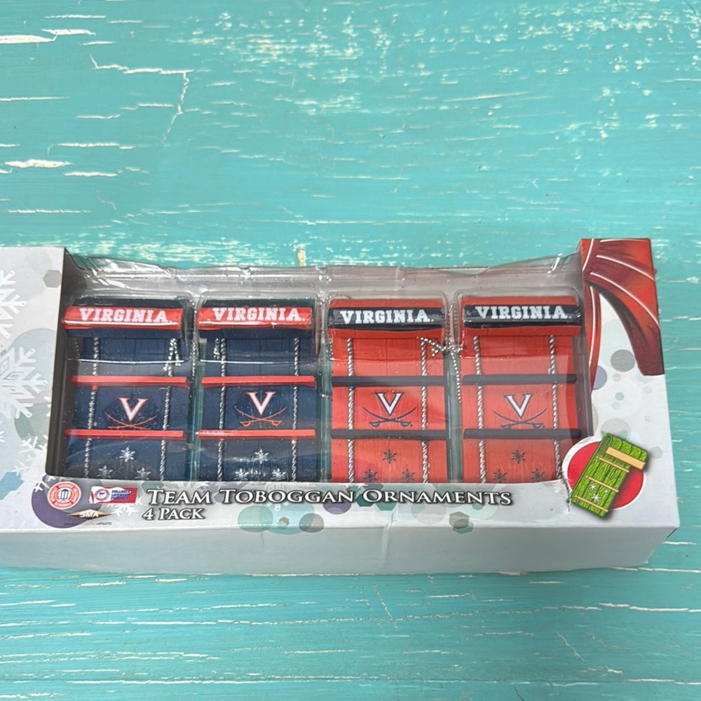 Ornaments. UVA Tobaggon ornaments. Never opened, in box.